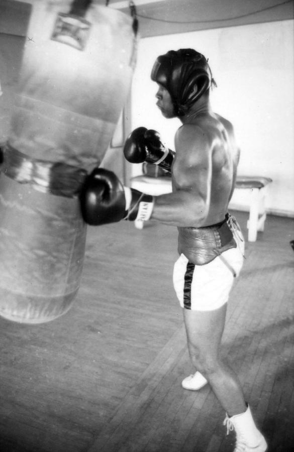Muhammad Ali Punching The Heavy Bag Photograph by Retro Images Archive