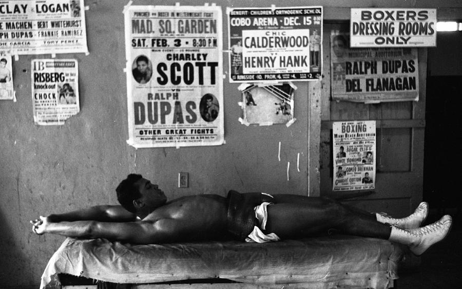 Vintage Photograph - Muhammad Ali Stretching by Retro Images Archive