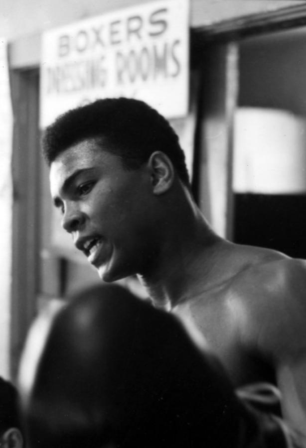 Vintage Photograph - Muhammad Ali Talking Outside Of Dressing Room by Retro Images Archive
