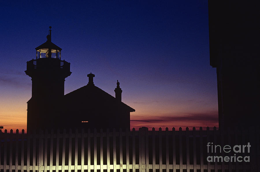 Mukeltio Lighthouse at twilight  Photograph by Jim Corwin