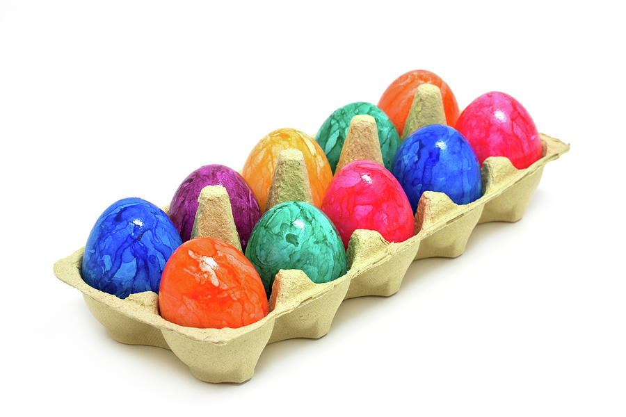 Multi Colored Easter Eggs In Egg Carton Photograph by Ursula Alter