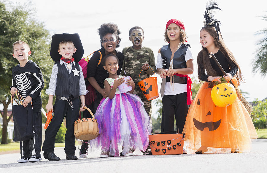 Multi-ethnic group of children in halloween costumes Photograph by Kali9