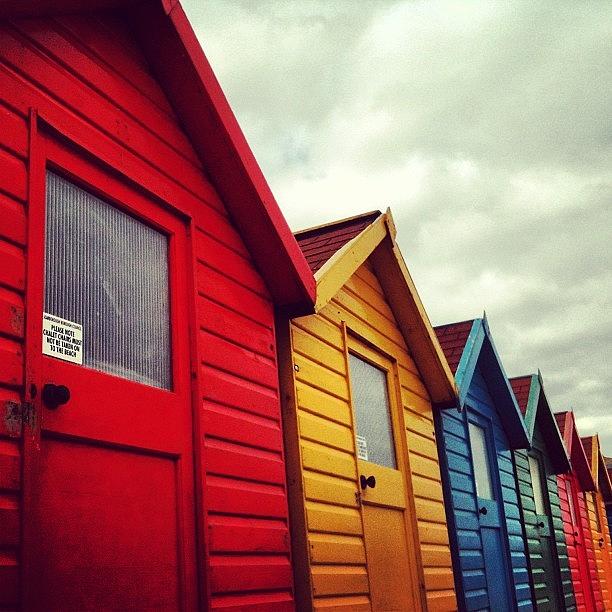 Beach Photograph - Multicoloured Beach Huts #whitby by Peter Edmondson