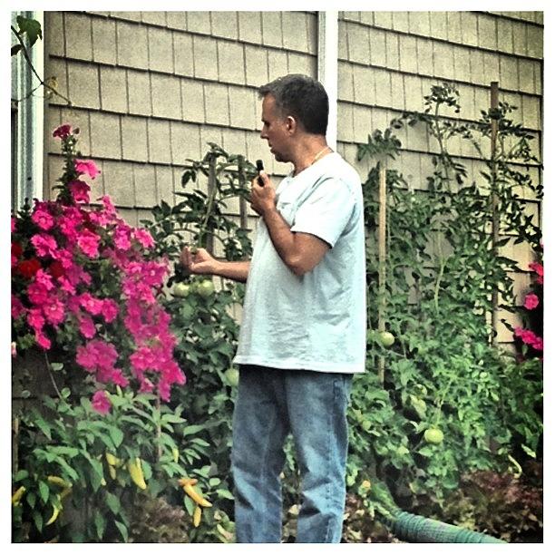 Tony Photograph - Multitasking; Gardening While by Gina Giancola