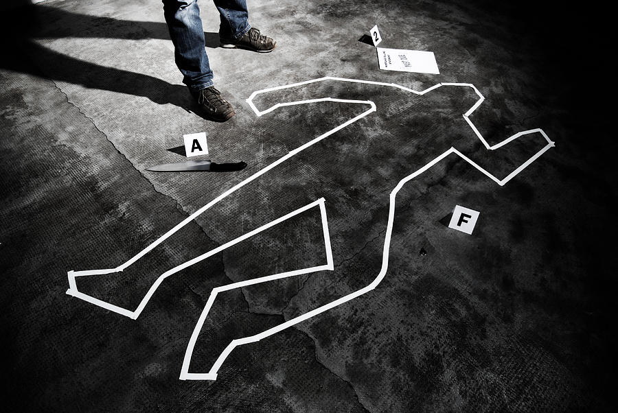 Murderer back on the crime scene Photograph by Ilbusca