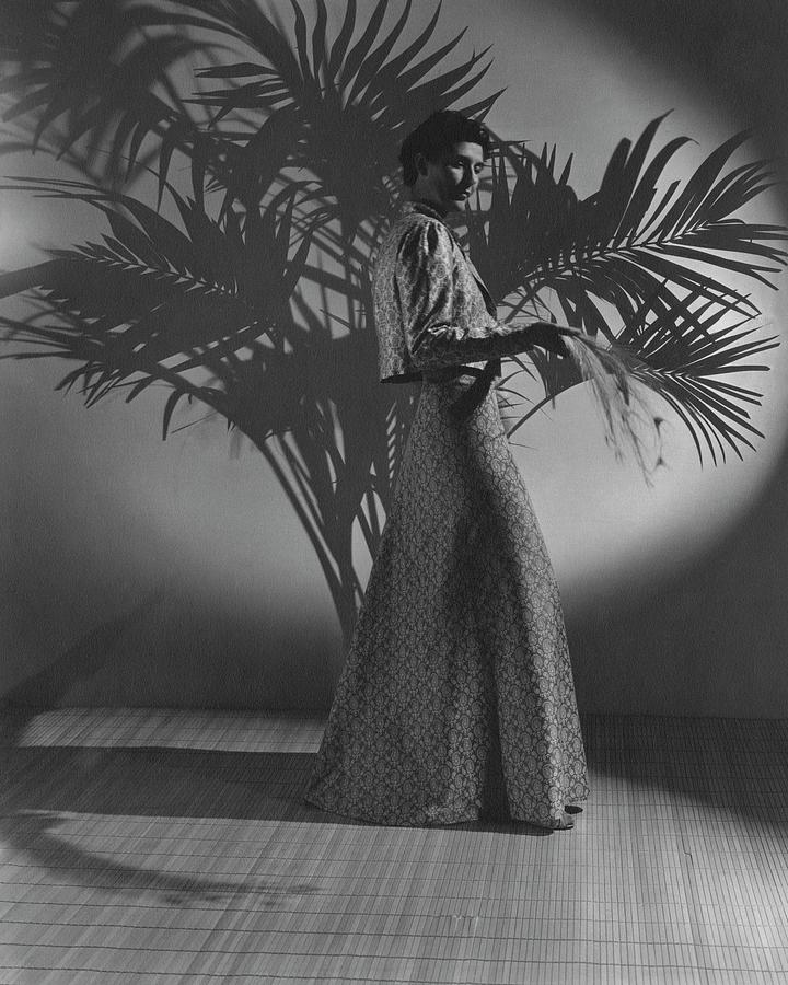 Muriel King Wearing A Dress And Jacket Photograph by John Rawlings