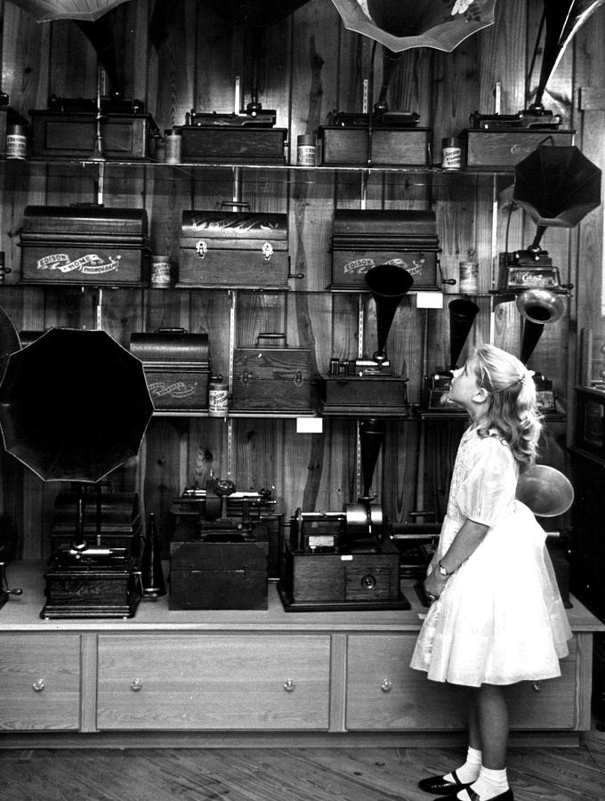 Vintage Photograph - Music boxes in store window by Retro Images Archive