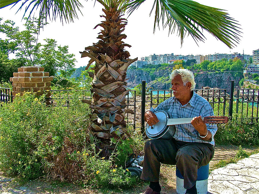 Musician by an Overlook Near Antalya Coast-Turkey Photograph by Ruth Hager