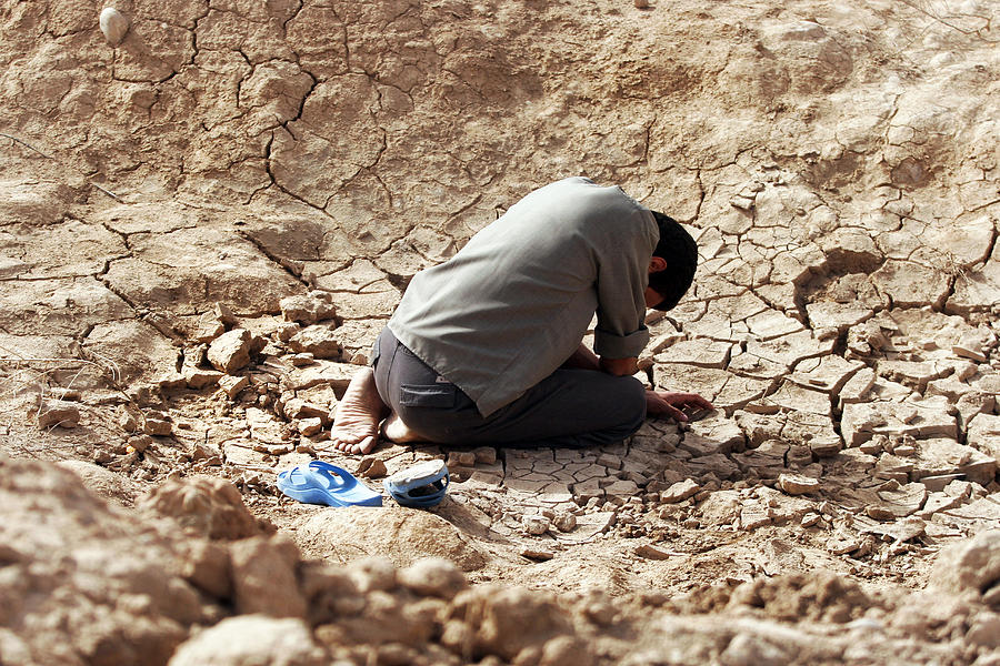 Muslim man is crying Photograph by Mansoreh  Motamedi