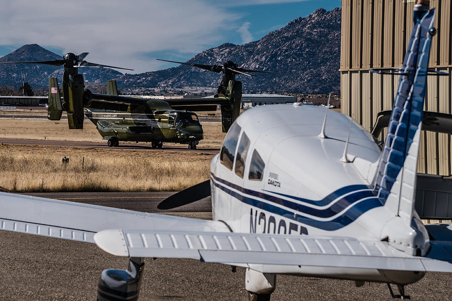 MV-22 Osprey and Piper Dakota Photograph by Alan Marlowe
