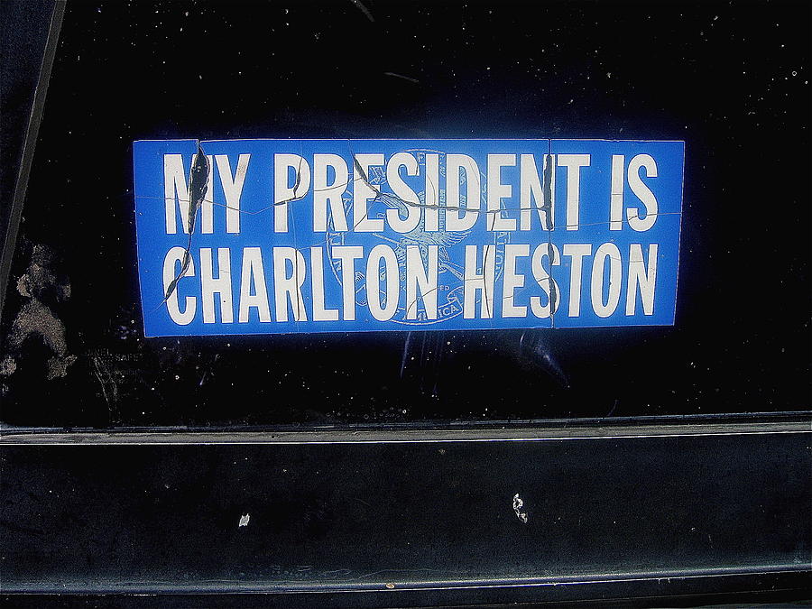 My President is Charlton Heston decal vehicle window Black Canyon City Arizona  2004 Photograph by David Lee Guss