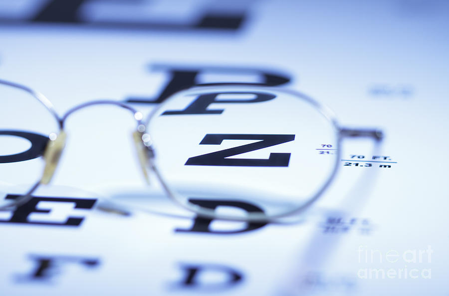 Myopic Spectacles On Snellen Eye Chart Photograph by GIPhotoStock