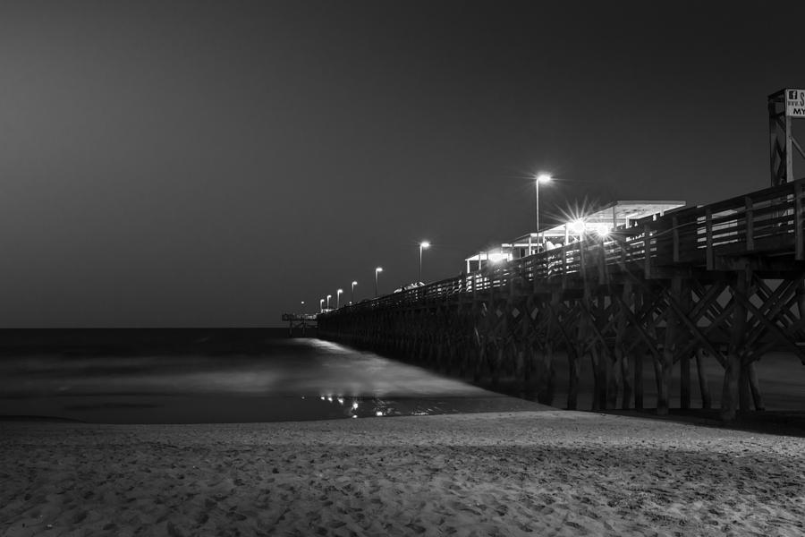Black And White Photograph - Myrtle Beach 2nd ave Pier at Night II by Ivo Kerssemakers