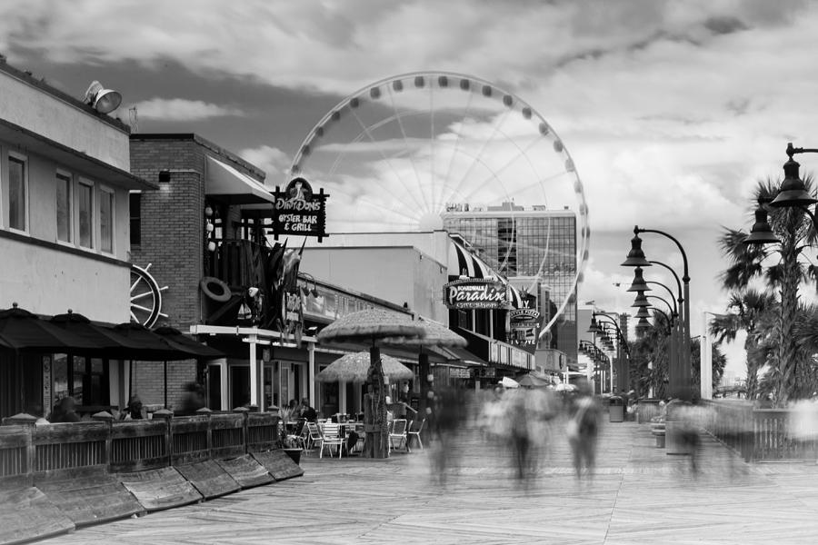 Black And White Photograph - Myrtle Beach Board Walk by Ivo Kerssemakers