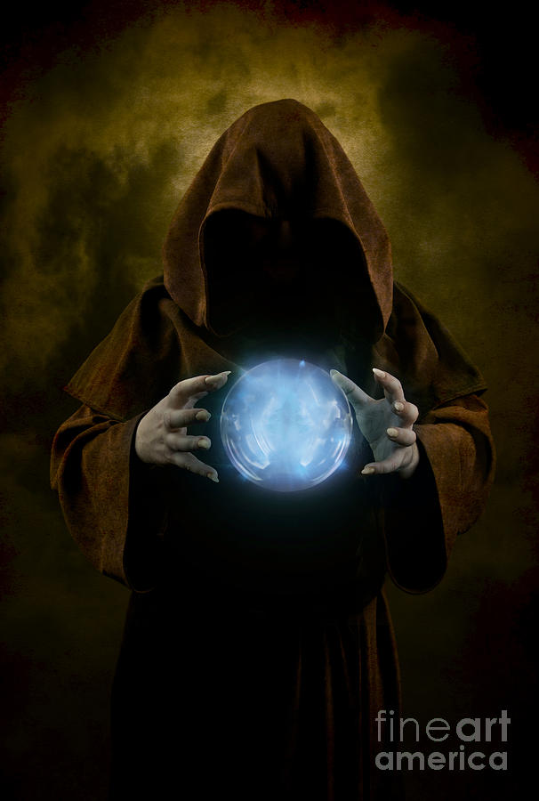 Magic Photograph - Mystery man wearing cloak with hood and blue glowing crystal ball between his hands by Jaroslaw Blaminsky