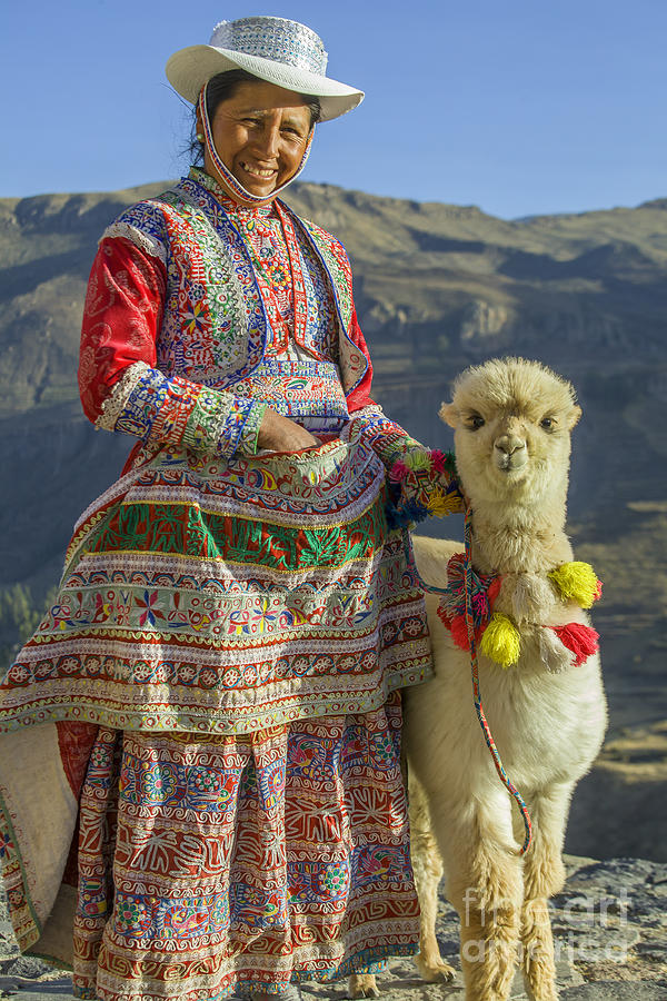 Native Peruvian woman with baby alpaca Photograph by Patricia Hofmeester