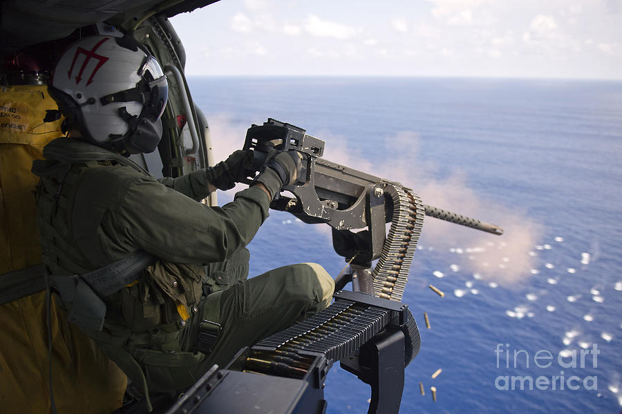 Naval Aircrewman Fires A .50-caliber Photograph