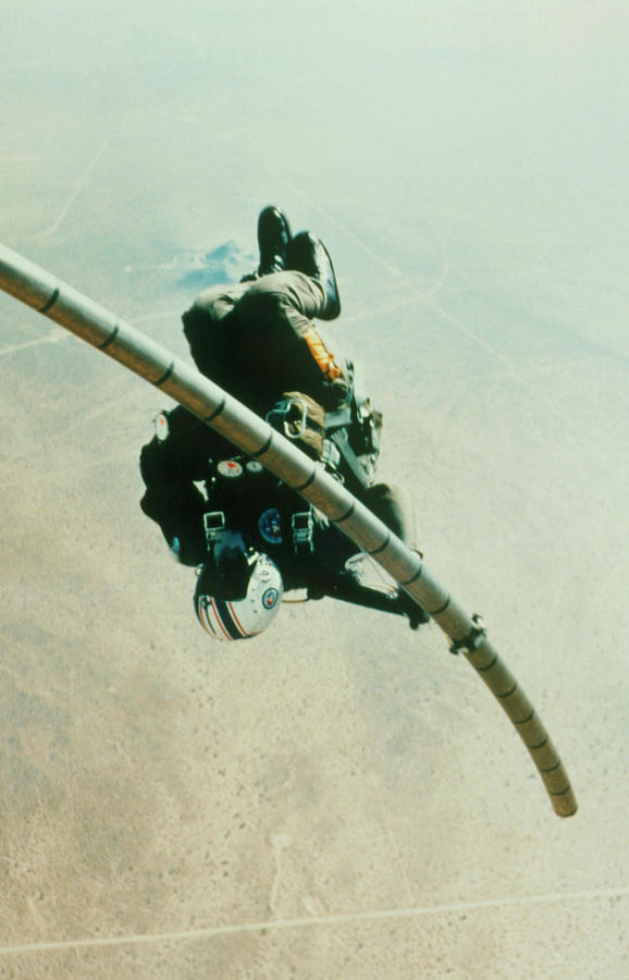 Navy Parachutist Slides Down Telescopic Pole Photograph by Nasa/science Photo Library