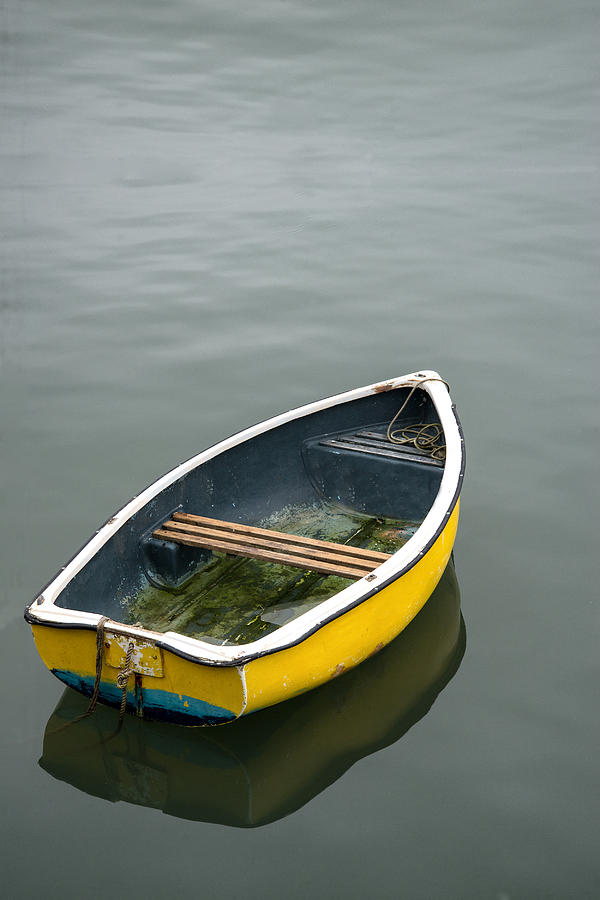 Neglected Old Rowing Boat On Calm Sea Water Photograph By Matthew
