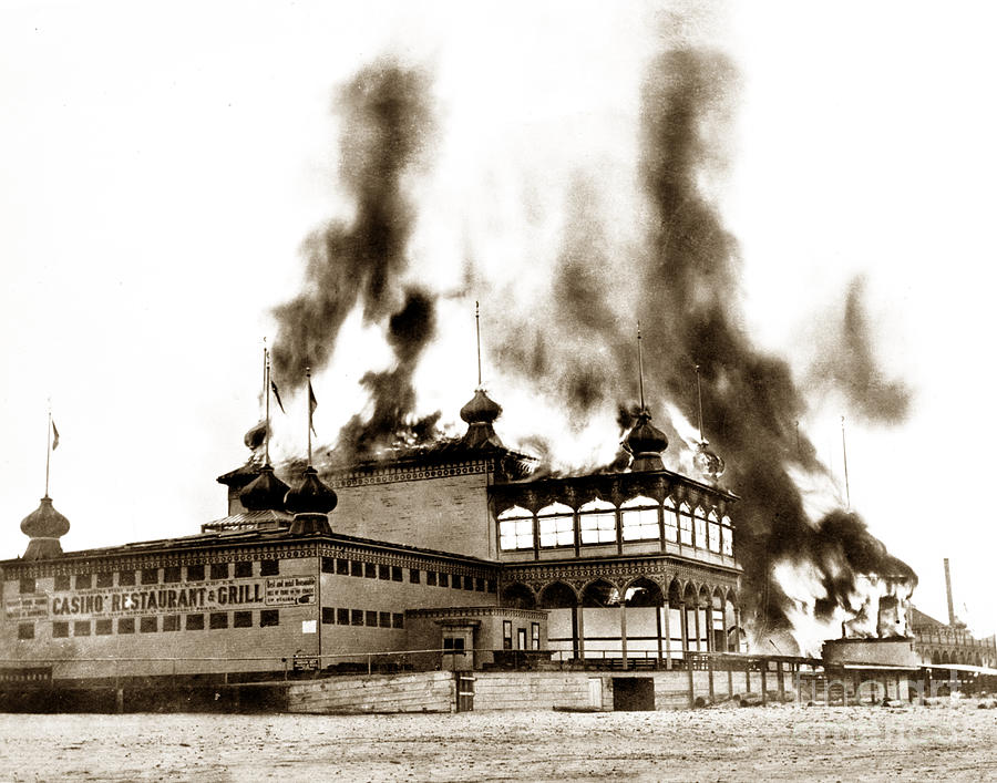 Summer Photograph - Neptunes Casino on Santa Cruz Beach burning on June 22 1906 by Monterey County Historical Society