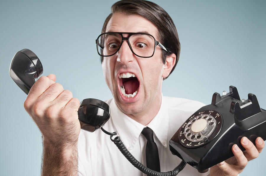 Nerdy Office Worker With Vintage Telephone Photograph by Spiderstock