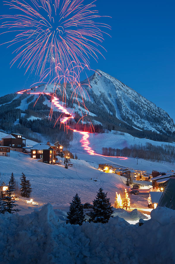 Winter Photograph - New Years Eve Fireworks and Torchlight Parade by Dusty Demerson