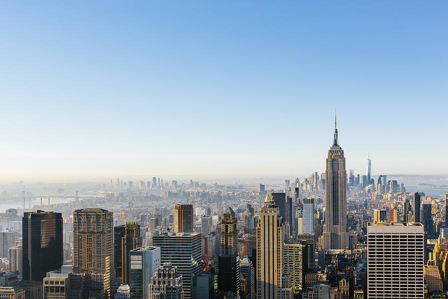 New York City cityscape in the morning with clear blue sky Photograph by Alexander Spatari