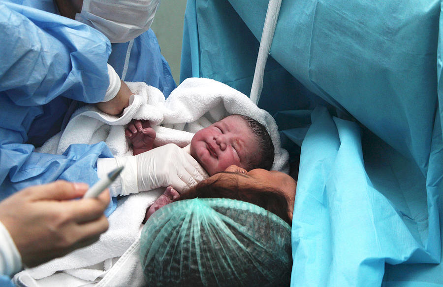 Newborn and Mother in hospital Photograph by Oceandigital