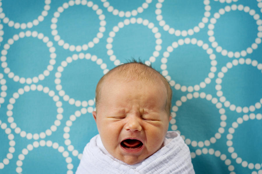 Newborn baby crying Photograph by Jade Brookbank