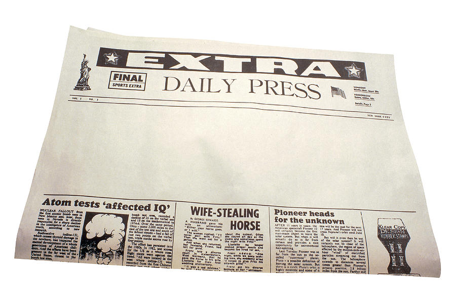 Newspaper with blank space for headlines Photograph by Comstock