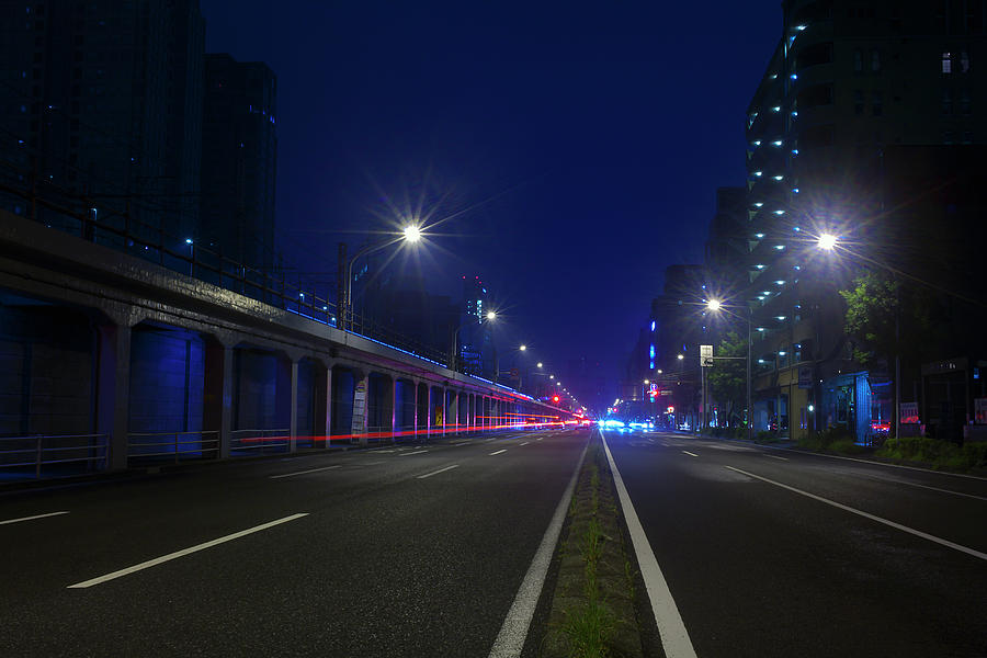 Night View Of A Straight Street In Photograph by Digipub