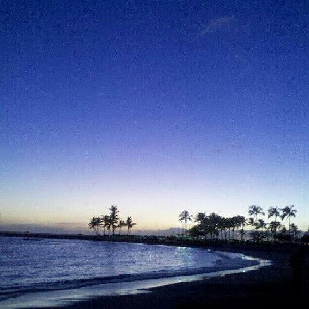 Night View Of Waikiki Beach Photograph by Ashley Flowers