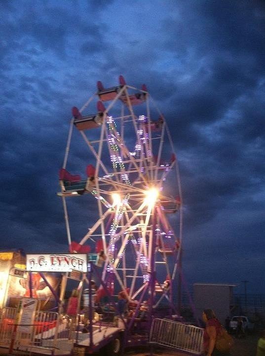 Ferris Wheel Photograph - Nightfall at the Fair by Suzanne Stratton