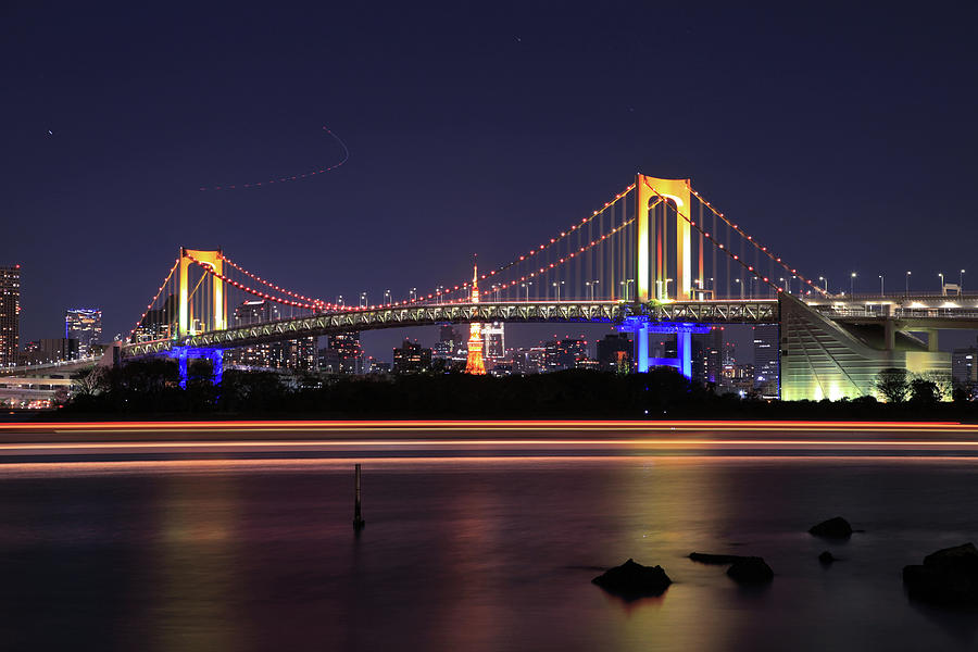 Nightview Of Rainbow Bridge Tokyo Photograph by Photography By Zhangxun