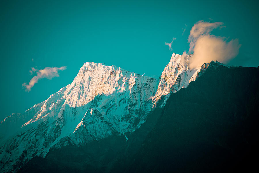 Nilgiri mountain in Himalayas with cloud Photograph by Raimond Klavins