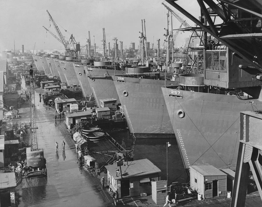 Nine Huge Liberty Cargo Ships At Docks Photograph by Everett
