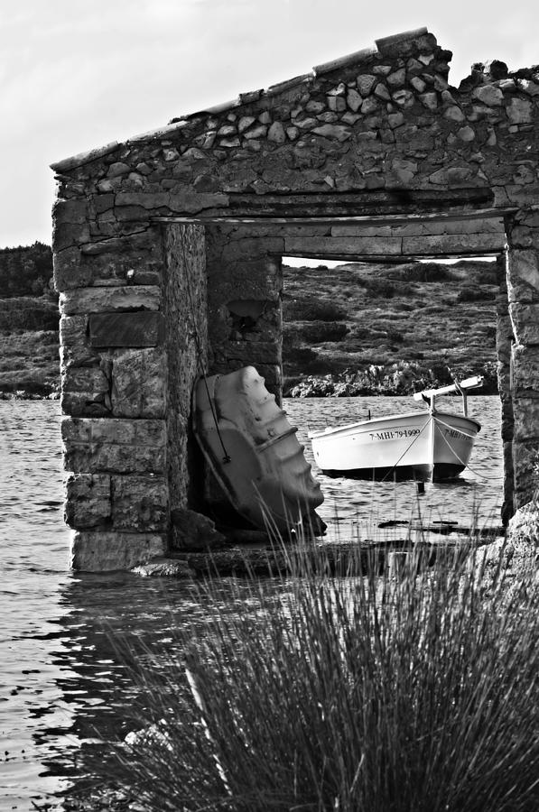 Vintage boat framed in nature of Minorca island - Waiting  Photograph by Pedro Cardona Llambias