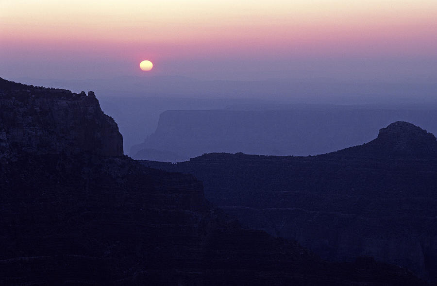 North Rim Grand Canyon sunrise light on rock formations Arizona  Photograph by Jim Corwin