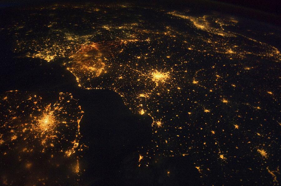 London Photograph - North-western Europe at night, ISS image by Science Photo Library
