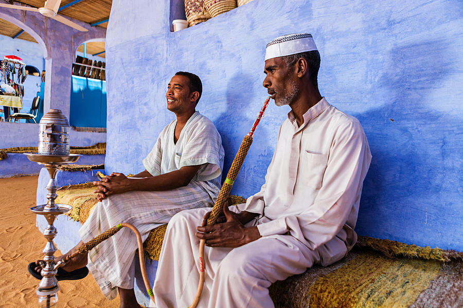 Nubian men smoking waterpipe in Southern Egypt Photograph by Hadynyah