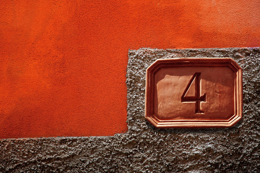 Number 4 Sign Against A Painted Plaster Photograph by Andrew Bret Wallis