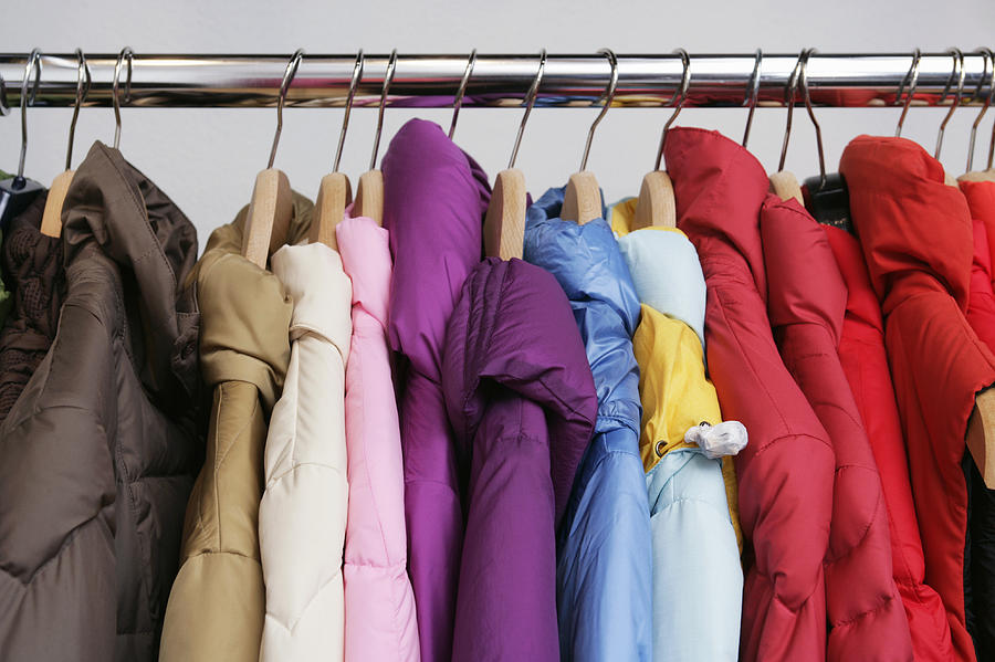 Numerous colorful jackets on a rack Photograph by Junior Gonzalez