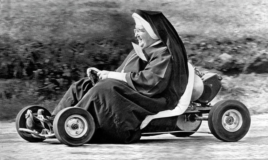 Akron Photograph - Nun On A Go-Kart by Underwood Archives