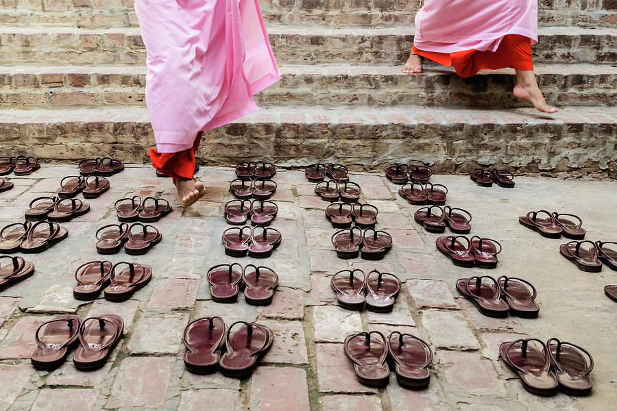 Nuns Leaving Sandals Outside Temple Photograph by Pixelchrome Inc
