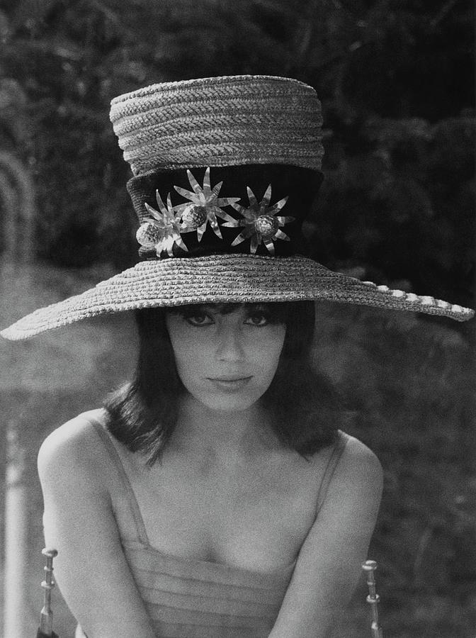 Nuria Toray Wearing A Straw Hat Photograph by Henry Clarke