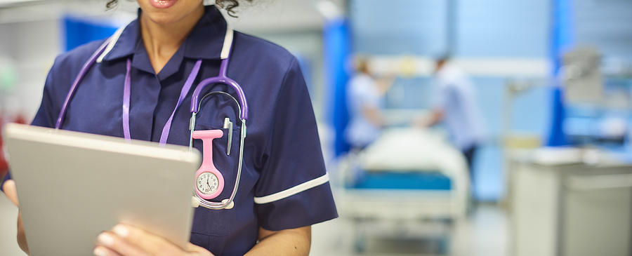 Nurse Close-up With Tablet Photograph by Sturti