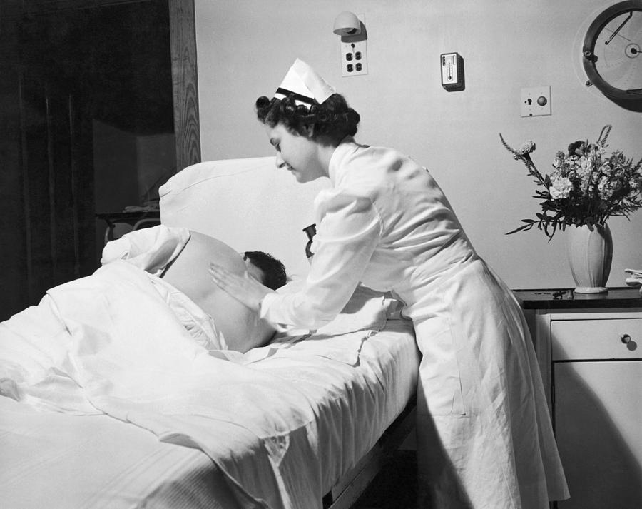 Nurse Gives Patient Rub Down Photograph By Underwood Archives Pixels