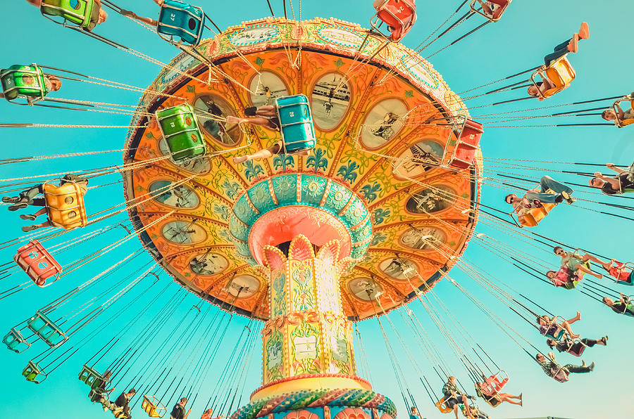 Summer Photograph - Yellow Carousel with Blue Sky  at Santa Cruz Beach Boardwalk by Lynn Langmade