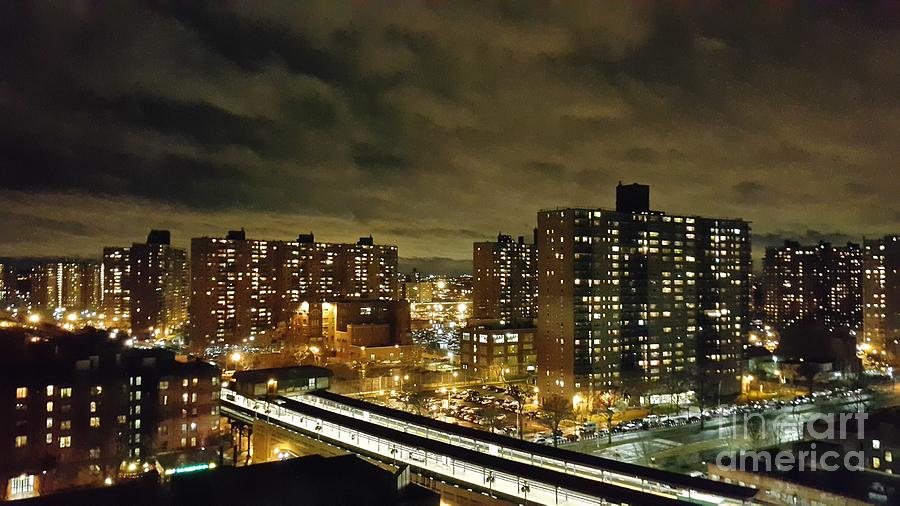 NYC Skyline On Stormy Night Photograph by John Telfer