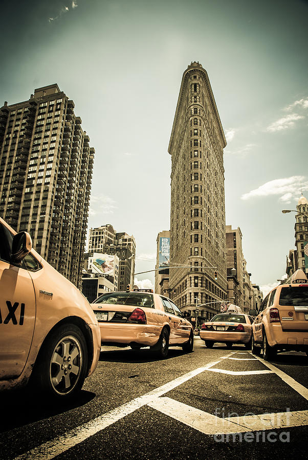 NYC Yellow cabs at the flat iron building - V1 Photograph by Hannes Cmarits